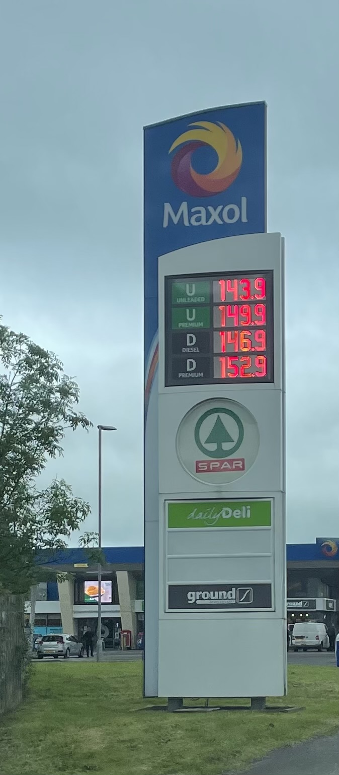 Picture of sign showing petrol prices in the UK